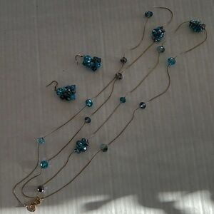 Long Faceted Aqua Beaded Necklace and Pierced Earrings   60” long necklace.